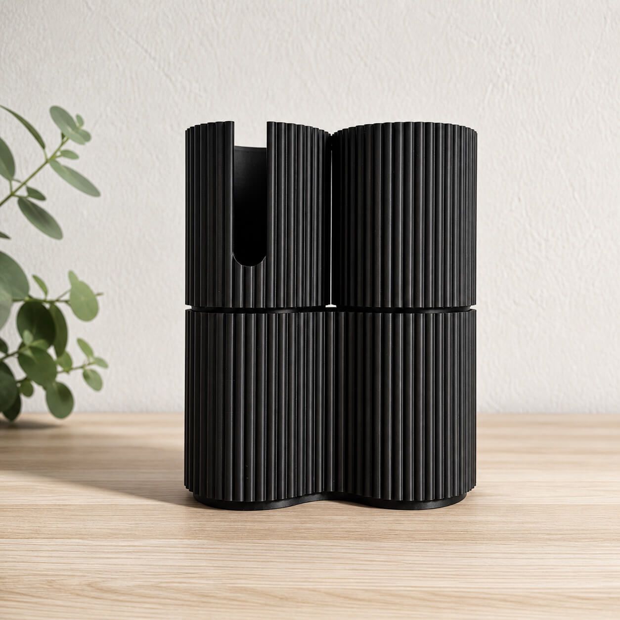 Black modular 3D-printed storage set for bathroom essentials