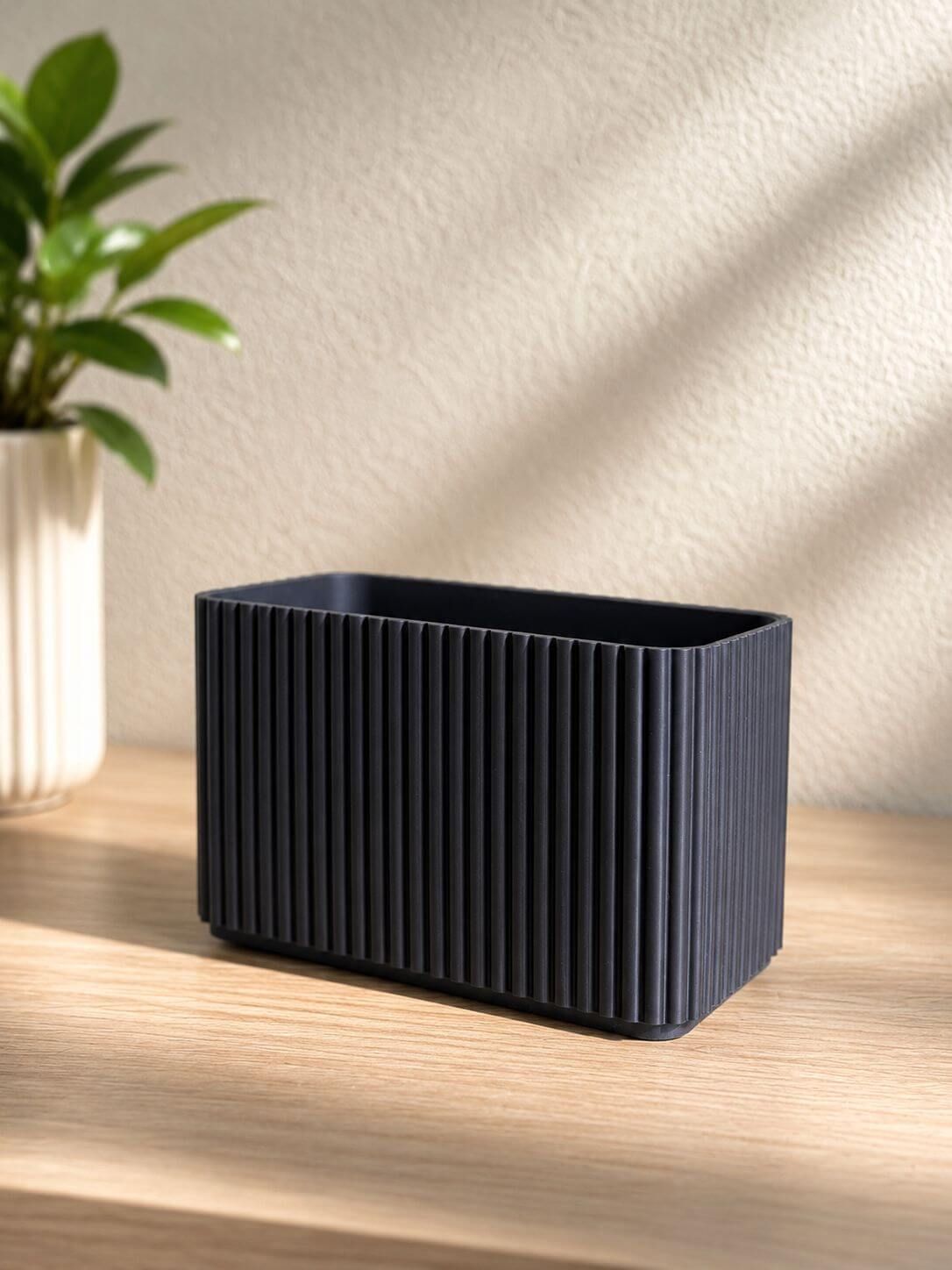 Black square 3D-printed storage set for bathroom essentials